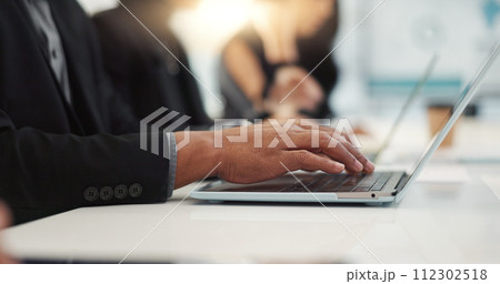 Hands of man at meeting in office with laptop, email or social media for business feedback, schedule or agenda. Networking, typing and businessman online for market research, report and workshop. Hands of man at meeting in office with laptop, email or social media for business feedback, schedule or agenda. Networking, typing and businessman online for market research, report and workshop. 112302518
