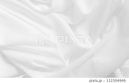 Soft focus white smooth ripple linen fabric on detail texture background Soft focus white smooth ripple linen fabric on detail texture background 112304946
