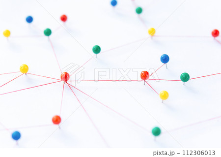 Linking entities, Blockchain, social media, Communications Network, The connection between the two networks. Network simulation on paper linked together by yarn Linking entities, Blockchain, social media, Communications Network, The connection between the two networks. Network simulation on paper linked together by yarn 112306013