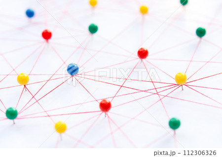Linking entities, Blockchain, social media, Communications Network, The connection between the two networks. Network simulation on paper linked together by yarn Linking entities, Blockchain, social media, Communications Network, The connection between the two networks. Network simulation on paper linked together by yarn 112306326