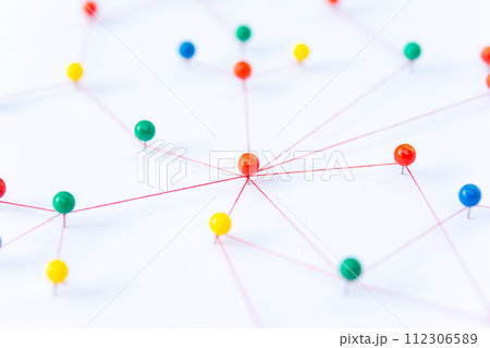 Linking entities, Blockchain, social media, Communications Network, The connection between the two networks. Network simulation on paper linked together by yarn 112306589