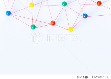 Linking entities, Blockchain, social media, Communications Network, The connection between the two networks. Network simulation on paper linked together by yarn Linking entities, Blockchain, social media, Communications Network, The connection between the two networks. Network simulation on paper linked together by yarn 112306595