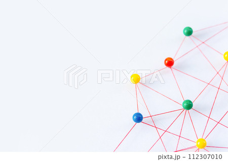 Linking entities, Blockchain, social media, Communications Network, The connection between the two networks. Network simulation on paper linked together by yarn 112307010