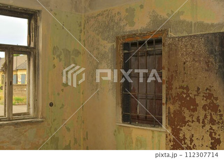 Devastated room. Destroyed squat. Derelict home. Homeless living 112307714