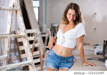 Sexy woman posing in building site 112312497