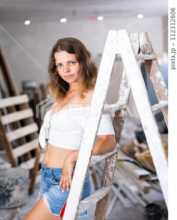 Sexy woman posing in building site 112312606