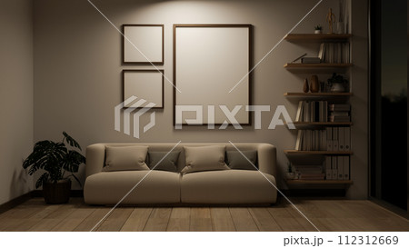 The interior design of a cosy, contemporary living room at night features a cosy couch and decor. 112312669