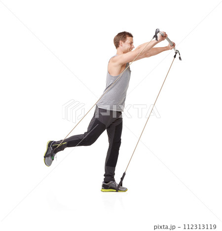 Fitness, gym and resistance band with a young man in studio isolated on a white background for health. Workout, exercise or performance and a strong athlete training with equipment for wellness 112313119