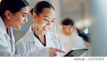Scientist, women and teamwork on tablet and computer for laboratory advice, medical research and night planning. Students, science people or mentor on digital technology of test results or comparison 112313931