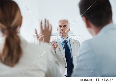 Presentation, question and training person in meeting as coach and mature mentor with advice. People, learning and faq in seminar with feedback from team and explain ideas in teaching workshop 112313987