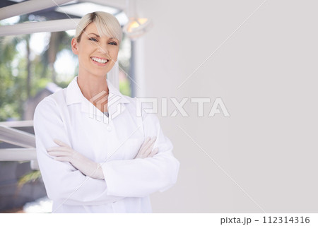Portrait, dentist and doctor woman in clinic with confidence, expert advice and orthodontics for medical health. Dental medicine, healthcare and professional with pride, arms crossed and oral service 112314316