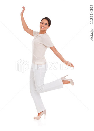 Woman, winner and celebration in studio for success, winning and achievement with fashion, bonus or sale. Portrait of an excited person with heels, yes and stylish clothes on a white background 112314392