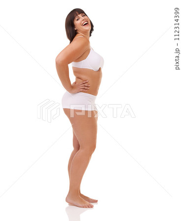 Portrait, beauty and laughing with body positive woman in studio isolated on white background for vitality. Smile, funny or natural and confident young plus size model with positive health attitude Portrait, beauty and laughing with body positive woman in studio isolated on white background for vitality. Smile, funny or natural and confident young plus size model with positive health attitude 112314399