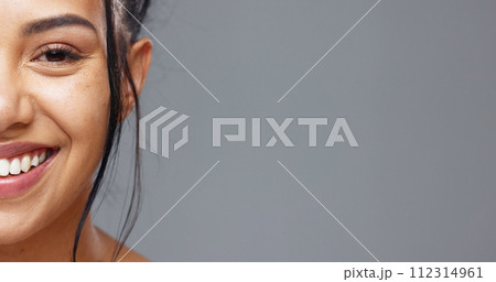 Happy woman, face and teeth on mockup for dental, beauty or hygiene against a grey studio background. Portrait of female person or model big smile for skincare cosmetics, oral or mouth and gum care 112314961