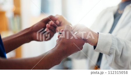 Homecare, holding hands or empathy by caregiver for senior woman in a house with kindness, comfort or support closeup. Hope, recovery or nurse and old person with understanding, trust or compassion 112315058