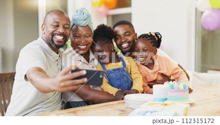 Selfie, birthday and black family of children and parent together for bonding, love and care. African woman, man and happy kids at home for a picture, quality time and bonding or fun at a party 112315172