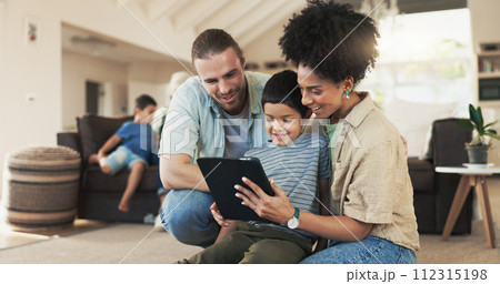 Tablet, home and happy family parents, kid or people working on e learning, knowledge or helping son with studying. Elearning, remote online education and young child, mother and father bond together 112315198
