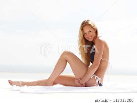 Fashion, woman and happy at beach with swimsuit in summer for break and confidence on vacation. Female person, bikini and outdoor with smile on holiday to enjoy, relax and rest for leisure. Fashion, woman and happy at beach with swimsuit in summer for break and confidence on vacation. Female person, bikini and outdoor with smile on holiday to enjoy, relax and rest for leisure. 112315200