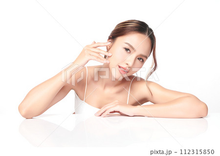 Beautiful young asian woman with clean fresh skin on white background, Face care, Facial treatment, Cosmetology, beauty and spa, Asian women portrait. Beautiful young asian woman with clean fresh skin on white background, Face care, Facial treatment, Cosmetology, beauty and spa, Asian women portrait. 112315850