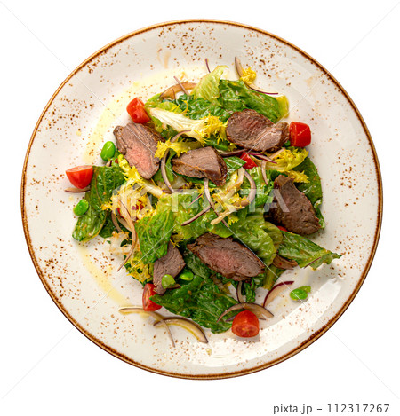 Isolated portion of roast beef salad with greens Isolated portion of roast beef salad with greens 112317267