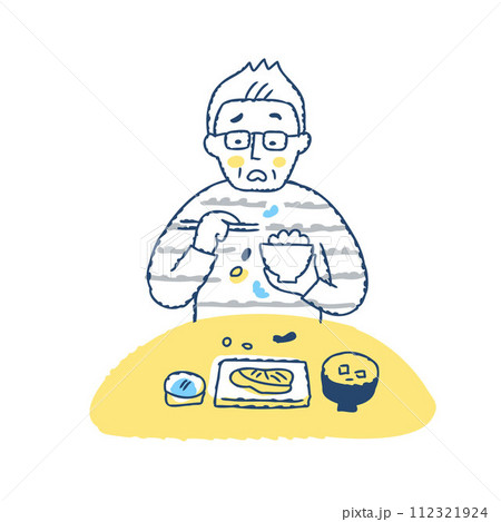 食事中に食べこぼすシニア男性 食事中に食べこぼすシニア男性 112321924