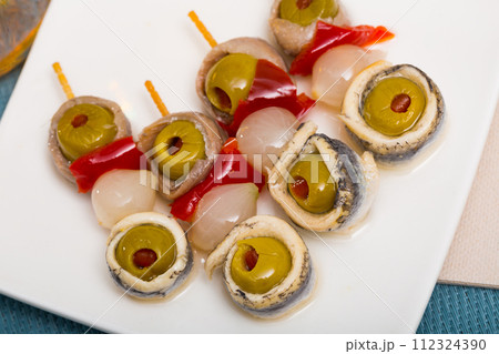 Salted anchovies with olives, bell pepper, onion Salted anchovies with olives, bell pepper, onion 112324390