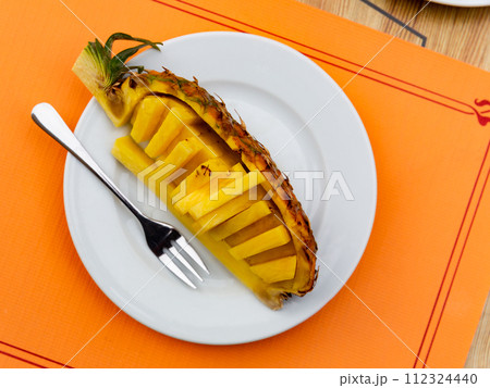 Beautifully sliced pineapple 112324440