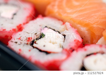 Bright beautiful rolls with fish close up 112327824