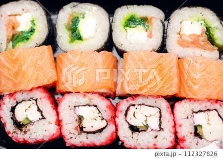 Bright beautiful rolls with fish close up 112327826