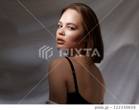Attractive model. Beautiful model girl with short Attractive model. Beautiful model girl with short 112330659