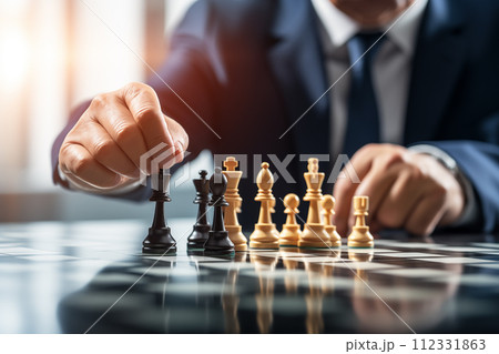Hand of businessman moving chess figure in competition. By generative Ai 112331863
