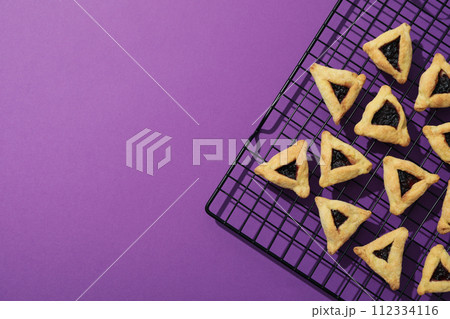 Purim holiday concept, with traditional symbols and decor. Purim holiday concept, with traditional symbols and decor. 112334116