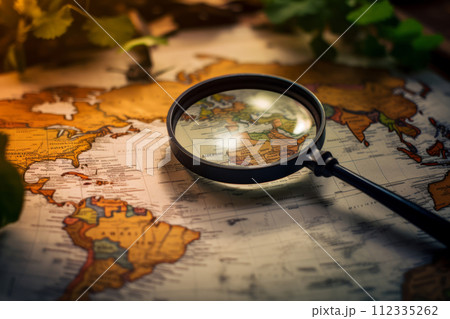 Magnifying glass searching country on map 112335262