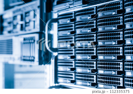 Row of hard disks used for data storage in internet data center Row of hard disks used for data storage in internet data center 112335375