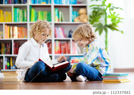 Child reading book. Kids read. School education. Child reading book. Kids read. School education. 112337881