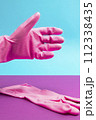 Hand in Pink latex glove in position for shaking. Hand shake 112338435