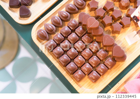 dark chocolate on a plate on table close up  112339445