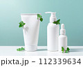 Cosmetic products on the table, white bottles and containers for skin care 112339634