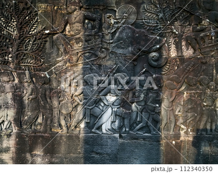 Bas relief sculpture on Bayon temple in Angkor, Cambodia 112340350