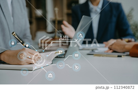 Businessman and Male lawyer or judge consult having team meeting with client, Law and Legal services concept in office. Businessman and Male lawyer or judge consult having team meeting with client, Law and Legal services concept in office. 112340872