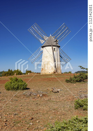 Windmill (Le Moulin de Redounel), La Couvertoirade in Larzac, Aveyron, France Windmill (Le Moulin de Redounel), La Couvertoirade in Larzac, Aveyron, France 112342881
