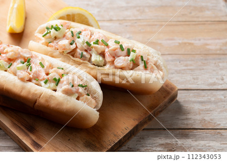 Lobster roll on wooden table Lobster roll on wooden table 112343053