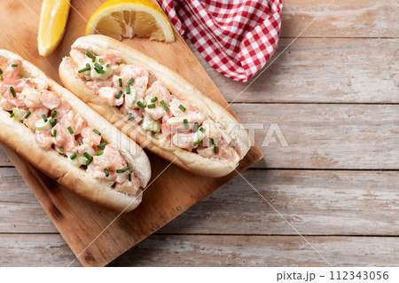 Lobster roll on wooden table Lobster roll on wooden table 112343056
