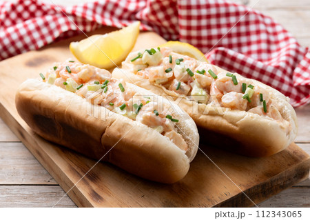 Lobster roll on wooden table Lobster roll on wooden table 112343065