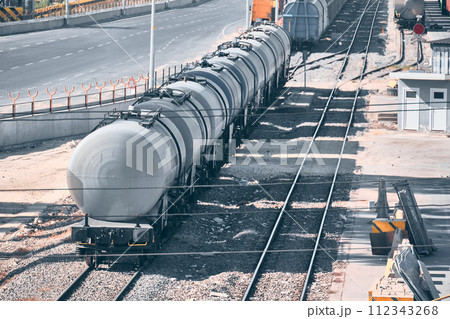 Tanks on railway track 112343268