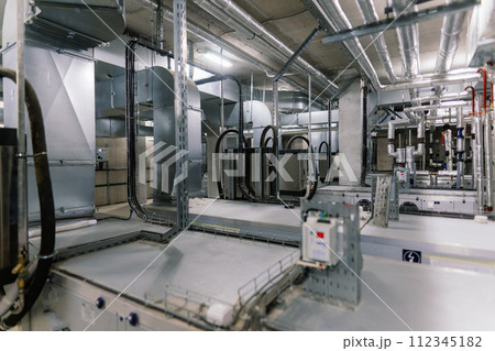 Pressure sensor in an industrial boiler room. Barometer in the heating system. Close-up. Pressure sensor in an industrial boiler room. Barometer in the heating system. Close-up. 112345182