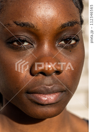 Close-Up Portrait of a Young African Woman Close-Up Portrait of a Young African Woman 112346565