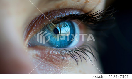 Beautiful blue eyes close-up for your design. 112347591
