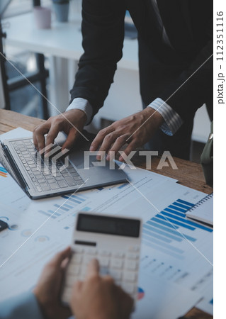 Co working conference, Business team meeting present, investor colleagues discussing new plan financial graph data on office table with laptop and digital tablet, Finance, accounting, investment. 112351116