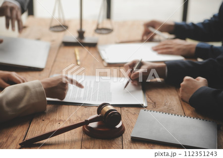 Good service cooperation, Consultation of Businesswoman and Male lawyer or judge counselor having team meeting with client, Law and Legal services concept. Good service cooperation, Consultation of Businesswoman and Male lawyer or judge counselor having team meeting with client, Law and Legal services concept. 112351243